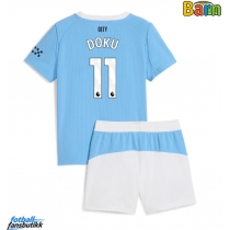 Manchester City Jeremy Doku #11 Hjemmedraktsett Barn 2025-26 Kortermet (+ Korte bukser)